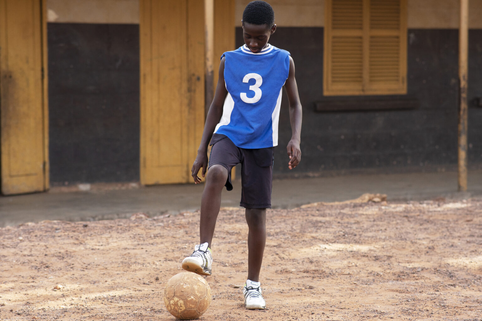 full-shot-kid-playing-with-ball